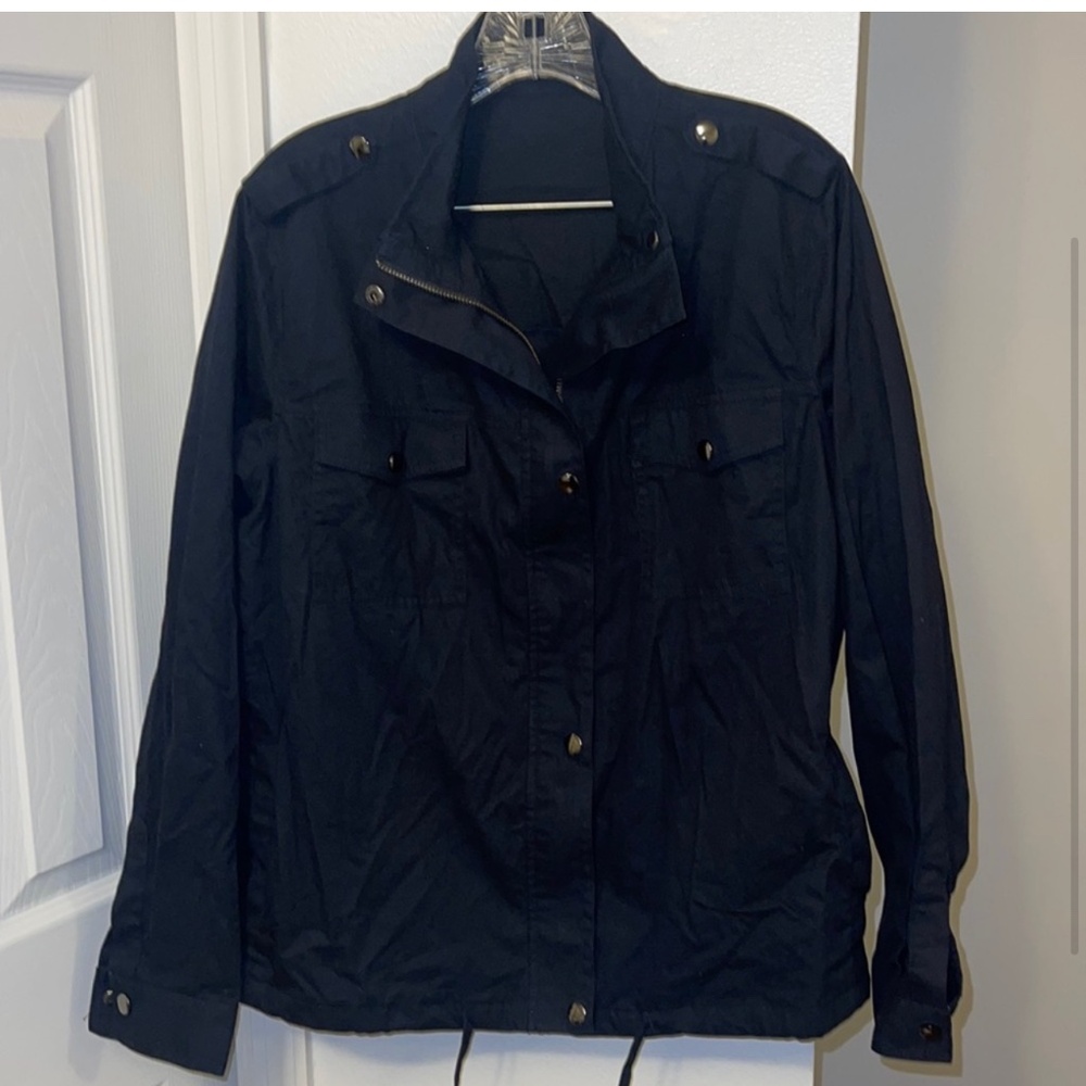 Front button jacket pockets on top and front slide